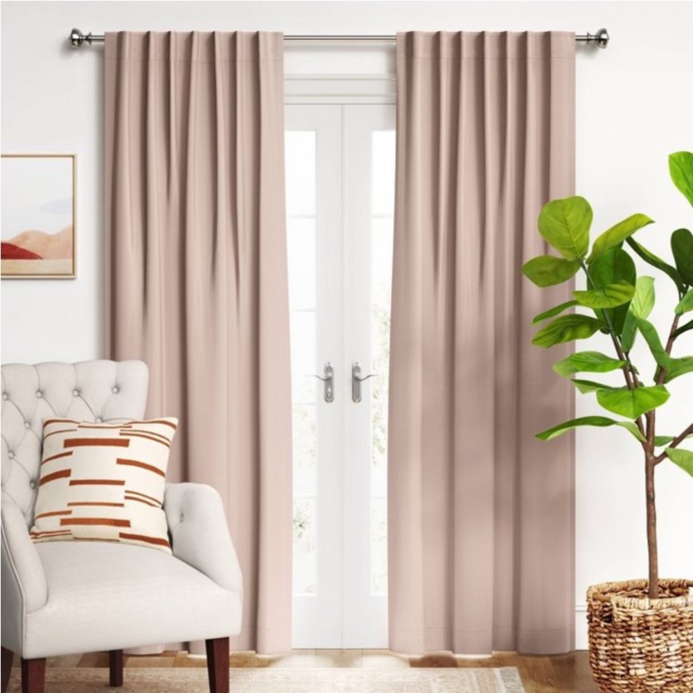 Two 50x84 blackout curtains. Beautiful muted/dusty pink color/velvety feel.